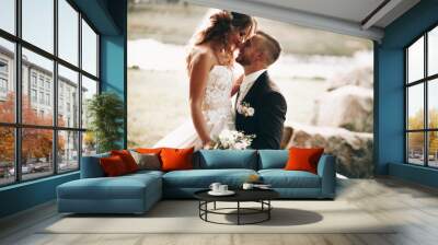 The happy couple.Wedding photos in nature.Couple in love Wall mural