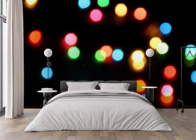 Light bokeh colorful in nightlight on black background Wall mural