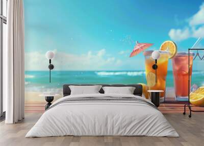 Two drinks with a slice of lemon on the side are on a beach Wall mural