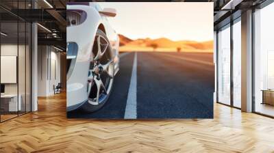 The front of the sports car The back is the desert. 3d rendering and illustration. Wall mural