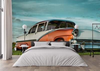 vintage car and grassland. Wall mural