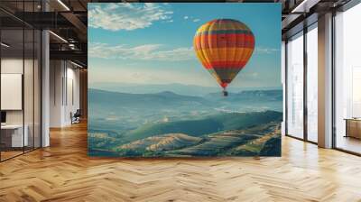 Colorful hot air balloons Floating high in the clear blue sky, the scenery is beautiful and bright. Wall mural