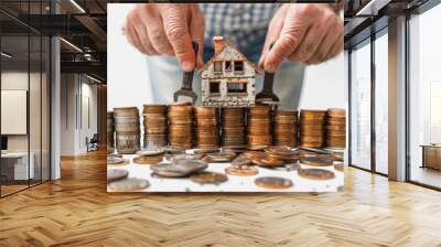 House on coins and hands with construction and repair tools on a white background. AI Generated Wall mural