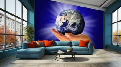 Earth in hand Wall mural