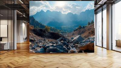 Majestic mountain landscape with rocky terrain and sunlight Wall mural