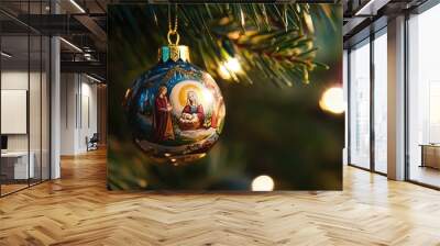 A simple hand-painted Nativity ornament, hanging from a branch of a Christmas tree, with soft light filtering through. Focus on the details. No people. Wall mural