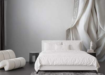 A traditional white cotton dhoti with silver borders, displayed against a plain white wall, no logos. Wall mural