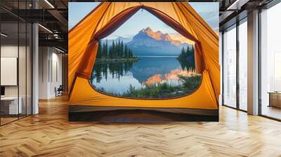 Close-up of a camping tent's window, with a view of a reflective lake and majestic mountains glowing softly in the early morning light. Wall mural