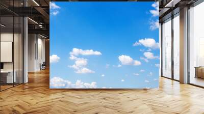 Blue sky background and white clouds soft focus, and copy space Wall mural