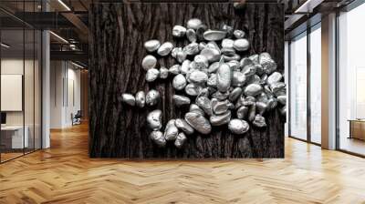 lump of silver or platinum ore on the old wooden floor Wall mural