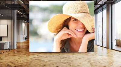 Happy woman smiling with perfect teeth on vacation Wall mural