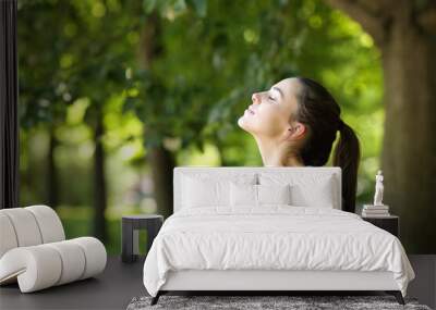 Student breathing fresh air in a campus or park Wall mural