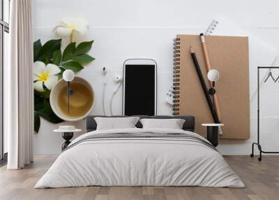 mobile phone ,notebook ,pencil of student writing note for study with ginger juice decoration flat lay style on background white wooden Wall mural