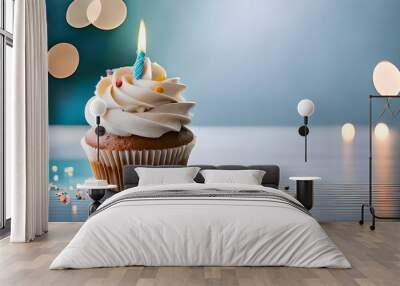 Delicious birthday cupcake on table on light background  Wall mural