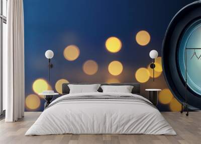 Camera lens with bokeh lights background Wall mural