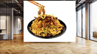 Beef in black bean sauce with egg noodles and cashew nuts meal with wood chopsticks isolated on a white background Wall mural