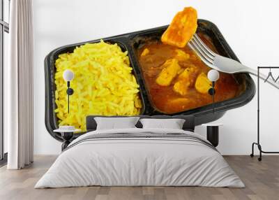 Chicken curry and rice microwave convenience meal isolated on a white background Wall mural