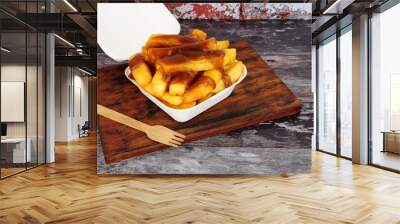 Chips and gravy meal in a take away box with lid Wall mural