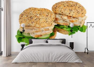 Roast chicken and salad sandwiches in multi seed topped bread rolls isolated on a white background Wall mural