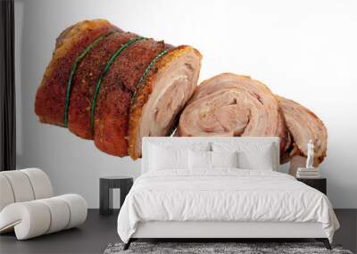 Roasted rolled lamb breast meat partly sliced isolated on a white background Wall mural