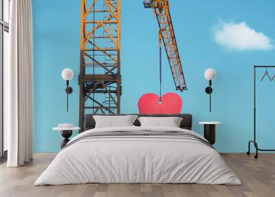 Love is in the air - crane with heart attached Wall mural