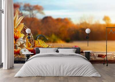 Basket Of Pumpkins, Apples And Corn On Harvest Table With Field Trees And Sky Background - Thanksgiving Wall mural