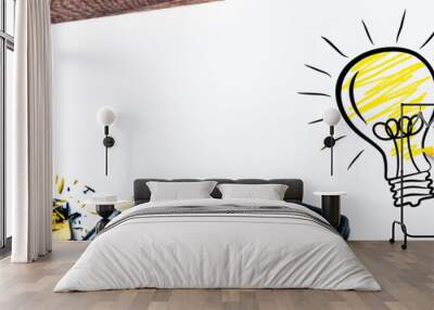 Hand Drawing Light Bulb On Paper - Bright Idea Concept Wall mural