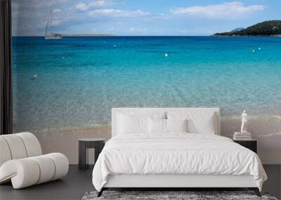 Yacht off Liscia Ruja beach Sardinia Wall mural