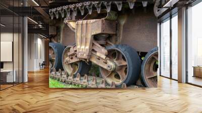 Detail of the wheels and track of a rusty Sherman WWII tank Wall mural