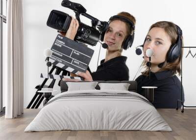 two young women with a video camera Wall mural