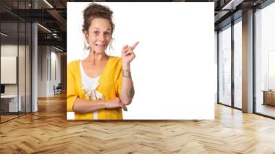 woman showing finger on copy space for product or text, isolated of white background. Wall mural