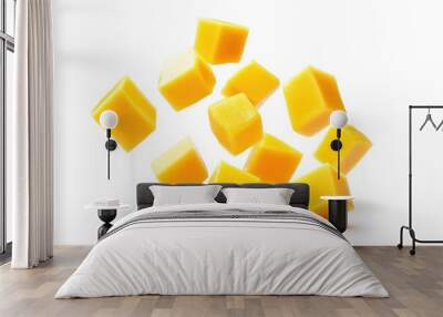 Cubes of ripe mango suspended in mid-air, isolated on a white background. Wall mural