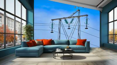 Isolated old power line with blue sky in the background Wall mural