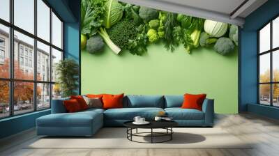 Flatlay of fresh vegetables on green background Wall mural