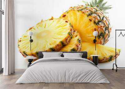 A whole pineapple and slices on a white background.  The fruit is ripe and ready to eat.  Photo isolated on white. Wall mural