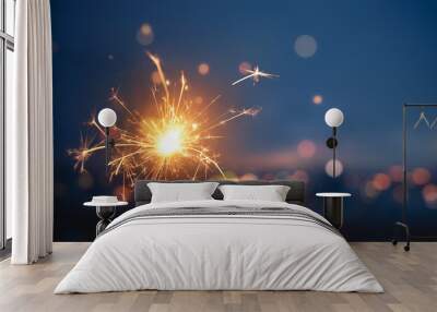 Sparkler with blurred busy city light background Wall mural