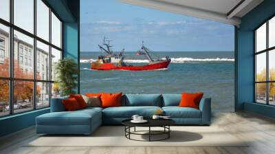 Red fishing boat on the sea Wall mural