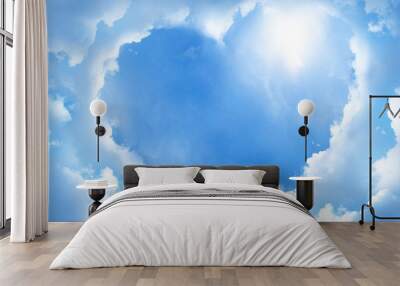 Heart frame shaped clouds on sky background. Wall mural