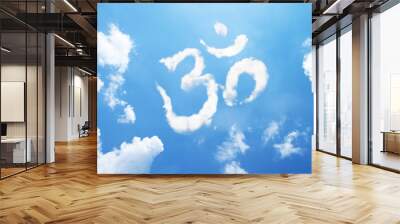 Om symbol clouds shaped on sky. Wall mural