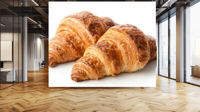 two croissants are sitting on a white surface Wall mural