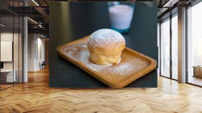 plain butter bread with icing sugar powder on wooden plate Wall mural