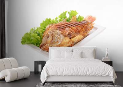 Fried Tilapia fish fried isolated on white background Wall mural