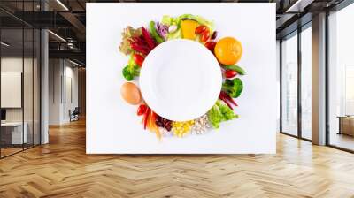 World food day, vegetarian day, Vegan day concept. Top view of fresh vegetables, fruit, with empty plate on white paper background. Wall mural