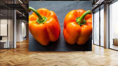 Vibrant Orange Bell Peppers Closeup on Dark Slate Background - Fresh, Glossy Vegetables for Food Photography, Cooking Blogs and More Wall mural