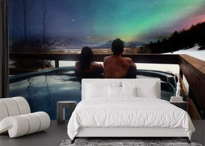 Asian couples in the hot tubs of luxury resorts and northern lights, traveling on holiday Iceland, travel ideas Wall mural