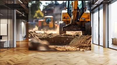 A backhoe digging soil and making foundation at construction site. Wall mural