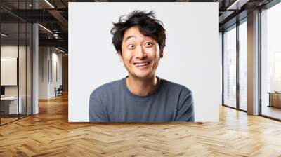 A Portrait of a funny Asian man on a white isolated transparent background. Wall mural