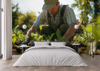 A seed-saving farmer planting heritage seeds in rich, organic soil, ensuring the survival of ancient crop varieties that support genetic diversity in agriculture Wall mural