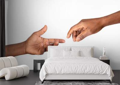 Hands reaching out to help or give. Two male hands trying to touch like in the creation of Adam isolated on white or transparent background Wall mural