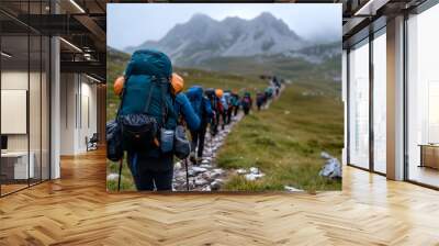 Group of Hikers Climbing Rugged Mountain Track | Adventure and Exploration in Nature Wall mural